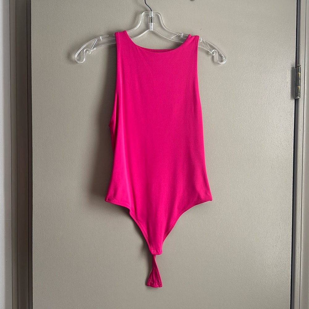 Pink body suit